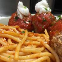 Classico Spaghetti & Meatballs · Hand rolled meatballs with bucatini, ricotta, basil, san marzano tomato sauce.