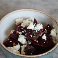 Beets · Goat cheese, pine nuts, basil.