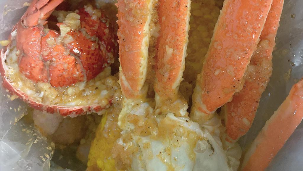 Combo 3 · Includes 1/2 lb. Snow Crab Leg,  1 lobster Tail, 1/2 lb. Shrimp, 2 Corns, 2 Potatoes