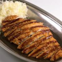 Fish Curry · Breaded fried Flounder cutlet, drizzled with tonkatsu sauce, served with shredded cabbage an...