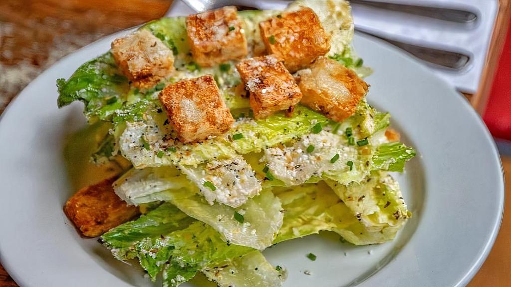 Ceasar Salad · housemade tater tot croûtons, everything spice, creamy anchovy dressing