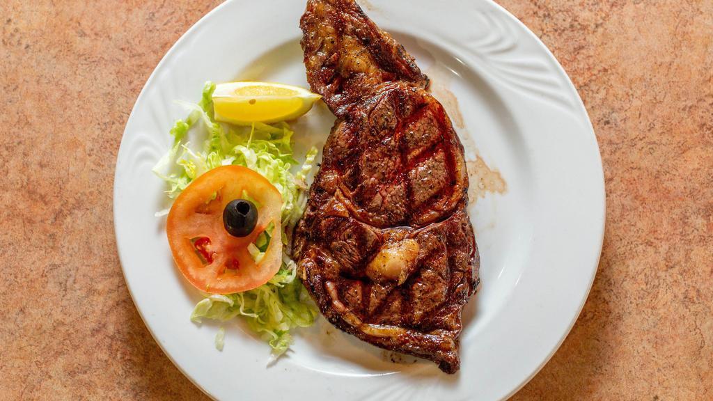 New York Strip Steak · a 16oz-choice cut.
