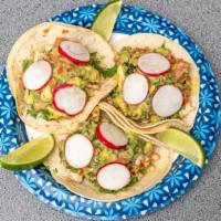 Tacos Dorados · 4 pieces. Corn tortilla, lettuce, cream, chicken, avocado, cheese & tomato.