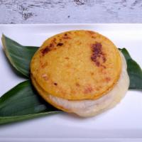 Arepa De Choclo · Sweet corn and melted cheese.