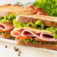 Ham Sandwich · Your choice of hot or cold ham, American cheese, fresh cut lettuce, sliced tomato, and your ...