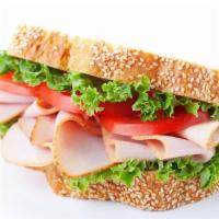 Turkey Sandwich · Your choice of hot or cold turkey, American cheese, fresh cut lettuce, sliced tomato, and yo...