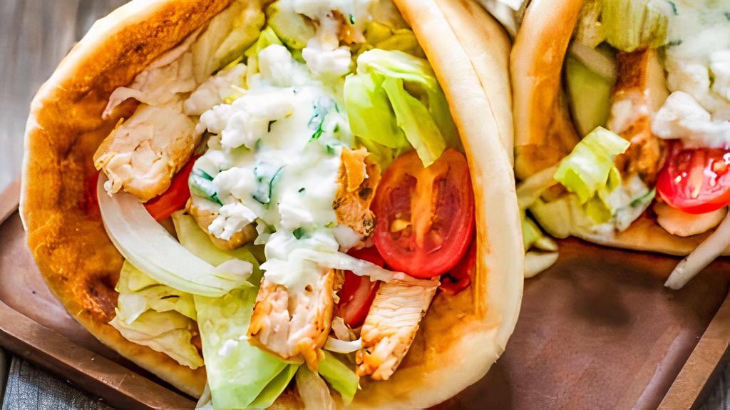 Grilled Chicken · Grilled chicken, lettuce, tomato, onions, and tzatziki sauce.