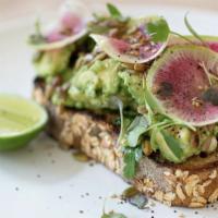 Avocado Toast · Meredith goats feta, seasonal herbs, watermelon radish, toasted seeds, lime.