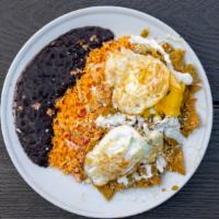 Chilaquiles Con Carne Platillo · Served with rice and beans. servido con arroz y frijoles.