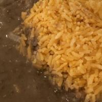 Arroz Y Frijoles · Rice and beans.