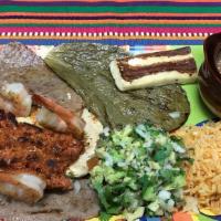 Parrillada · Grilled chicken breast, beef, pork, shrimp, sausage, cactus, jalapeños, and side of guacamole.