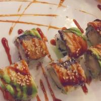 Dragon Roll · Eel, cucumber, topped with avocado, and fish egg.