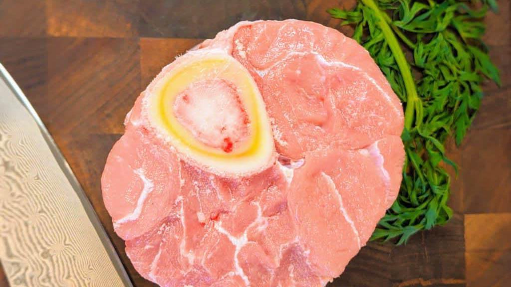 Veal Osso Buco - 20 Ounces · Osso Buco is Italian for “bone with a hole” (osso “bone”, buco “hole”), a reference to the marrow hole at the centre of the cross-cut veal shank. The marrow in the shank bones bathes everything in its rich flavor as it renders during the braise.