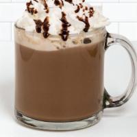 Hot Mocha · Cafe Au Lait sweetened with Ghirardelli® cocoa and topped with a whipped cream spiral.