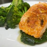 Broiled Salmon · Broiled salmon in a lemon,butter, wine sauce.  Served with 2 sides