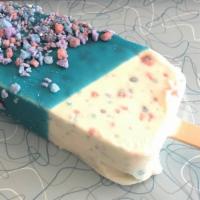 Cotton Candy Ice Cream Bar · Vanilla custard mixed with cotton candy sprinkles dipped in blue raspberry, rolled in cotton...