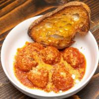 Meatball Bruschetta · Charred Sullivan Street bread, house made meatballs, parmigiano reggiano, san Marzano tomato