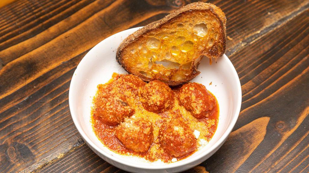 Meatball Bruschetta · Charred Sullivan Street bread, house made meatballs, parmigiano reggiano, san Marzano tomato