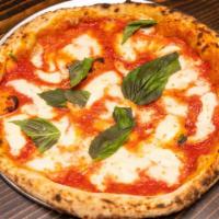 Fior Di Latte Pizza · Comes with tomato and basil.