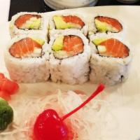 Salmon Avocado Cucumber Roll · Salmon, avocado, and cucumber wrapped inside out with sesame and tobiko.