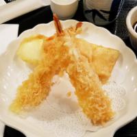 Tempura Appetizer · 2 pcs tempura shrimp & 3 pcs tempura veggies, served with tempura sauce.