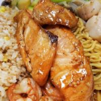 Hibachi Salmon & Scallop · With clear soup, green salad. Served with 2 pcs shrimp, fried rice, fried noodles and grille...