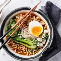 Japanese Udon Noodle Soup · A savory, seasoned bowl of soup with warm udon noodles.