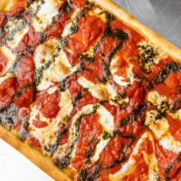 Grandma’S Pie · Fresh mozzarella and marinara sauce drizzled with a basil olive oil mixture.