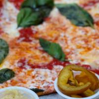 Fresh Margherita Pizza Slice · Topped with tomato sauce, fresh mozzarella, Fontina cheese, Grana Padano, basil, and a drizz...