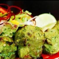 Haryali Chicken Kebab · Classic North Indian starter where chicken is flavoured with fresh green herbs - mint and co...