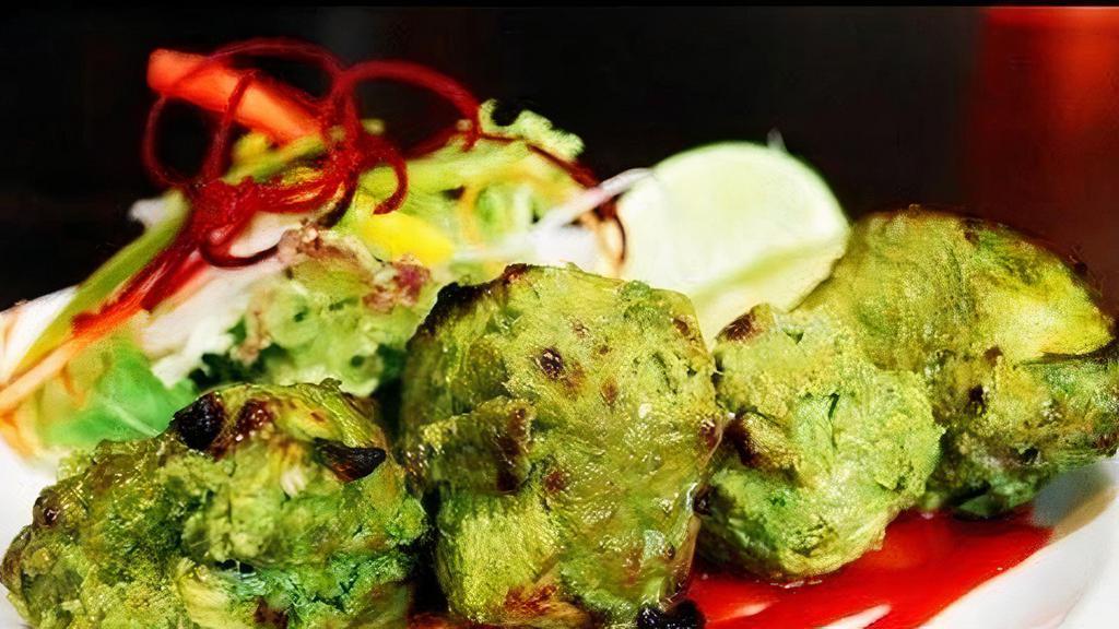 Haryali Chicken Kebab · Classic North Indian starter where chicken is flavoured with fresh green herbs - mint and coriander leaves along with spices