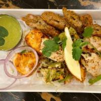 Non Veg Kebab Platter · Chicken Tikka, Malai kebab, Haryali kebab, Chicken Seekh kebab.