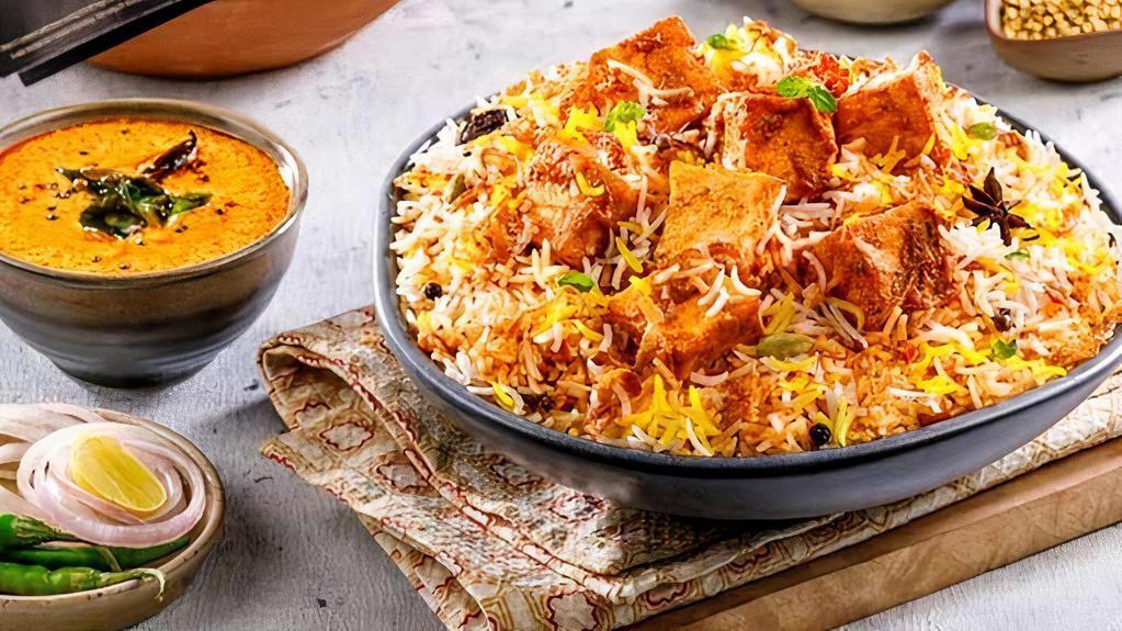 Paneer Biryani · Long grain basmati rice cooked with marinated cottage cheese along with Indian herbs.