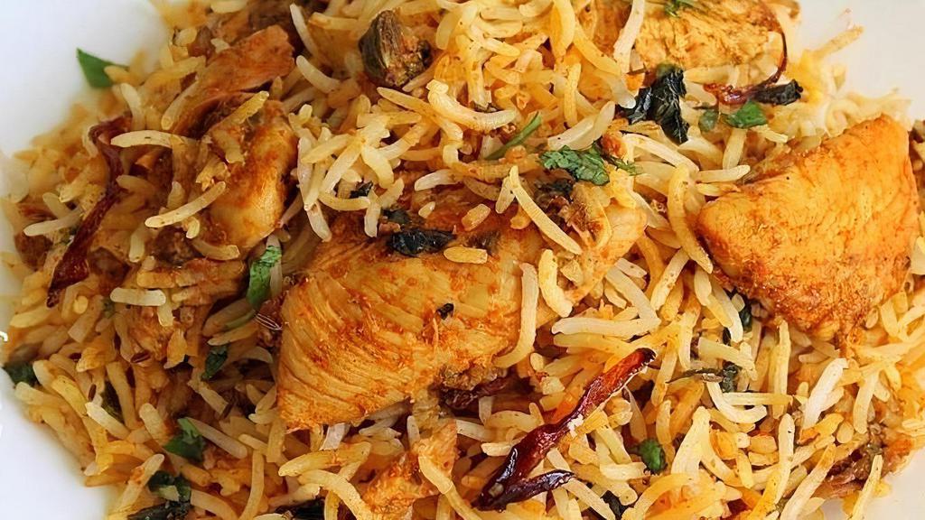 Samuha Spl Chicken Fry Biryani · Fried Boneless Chicken cooked in basmati rice over a low fire with Indian herbs.