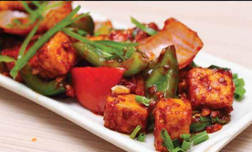 Chili Paneer · Fried Cubes of Cottage cheese with onion & bell pepper in a spicy chili sauce.