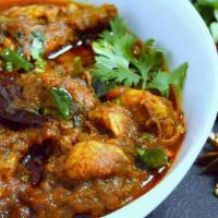 Chicken Chettinad · Typical South Indian Chettinad style preparation with boneless chicken, onions & spices.
