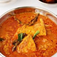 Malabar Fish Curry · Chunks of Boneless fish cooked in a Kerala style with coconut and curry leaves-based gravy.