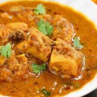 Chicken Mandakini · Boneless chicken cooked in spicy, tasty onion tomato and cashew gravy.