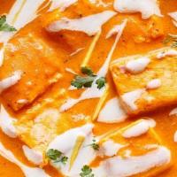 Paneer Butter Masala · Cottage cheese cubes in a rich creamy tomato-based gravy.
