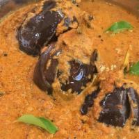 Gutti Vankaya Curry · Popular Andhra dish made with Eggplant stuffed with spices and cooked to perfection.