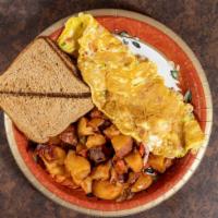 Western Omelette · With ham, peppers and onions, home fries and buttered toast.