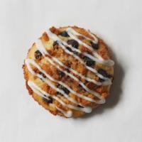 Blueberry Lemon Muffin Top · Lemon-infused batter topped with blueberries, almond crumbles, and lemon drizzle.
