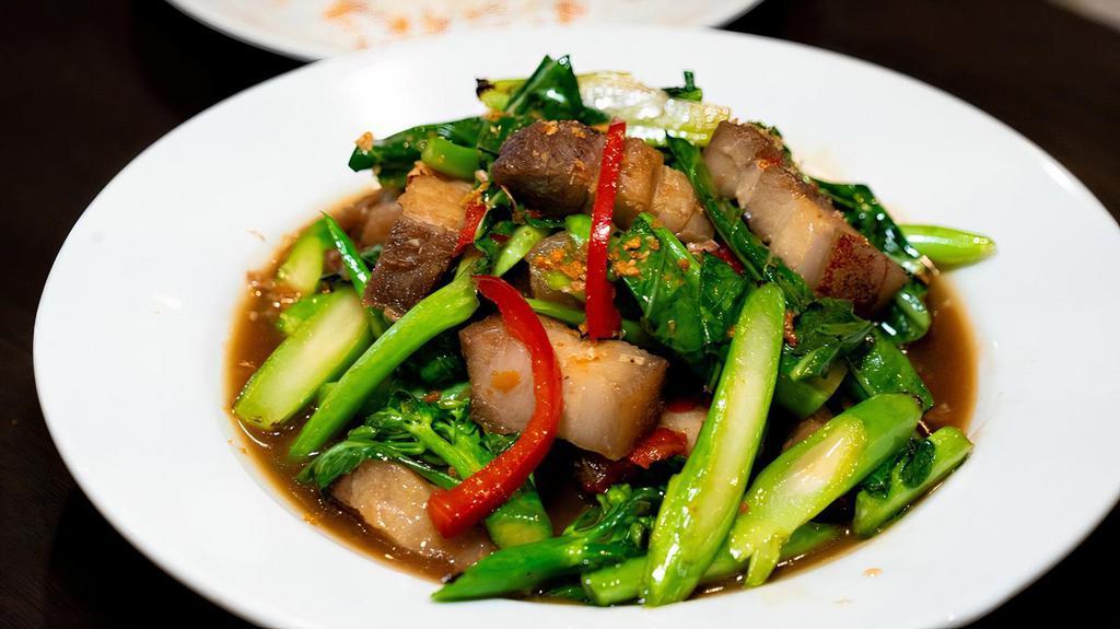 Kana Moo Krob · Spicy. Crispy pork belly, peppers, Chinese broccoli, house brown sauce. White rice.