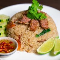 Nam Fried Rice · Fermented sour sausage, onion, garlic gai lan. Chili fish sauce.