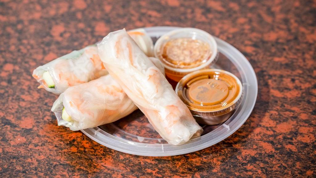 Shrimp Summer Rolls (2 Pieces) · Shrimp wrapped in rice paper with rice noodles, cucumbers, mint, shredded papaya and carrots. Served with our house made peanut sauce on the side