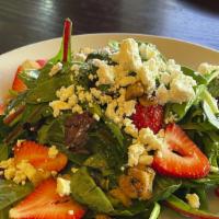 Goat Cheese Salad · Fresh strawberries, candied walnuts, goat cheese and aged balsamic vinaigrette.