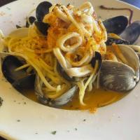 White Clam Combo · Linguine, shrimp, little neck clams, mussels, calamari, virgin olive oil, garlic, basil, toa...