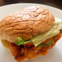 Spicy Chicken Sandwich · Spicy golden fried chicken breast with lettuce, tomato, pickles, and chipotle mayo.