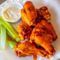 Buffalo Wings · Served with celery, Bleu cheese, and tossed in choice of sauce.