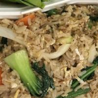Spicy Fried Rice · Hot. Sauteed rice with egg, onions, bell peppers, string beans, chili and basil in chili gar...